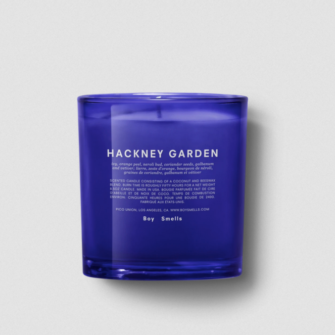boy smells hackney garden candle scent